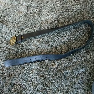 Navy leather belt with gold sailboat buckle